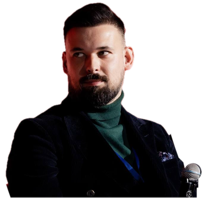 Борис Абрамов с микрофоном на конференции